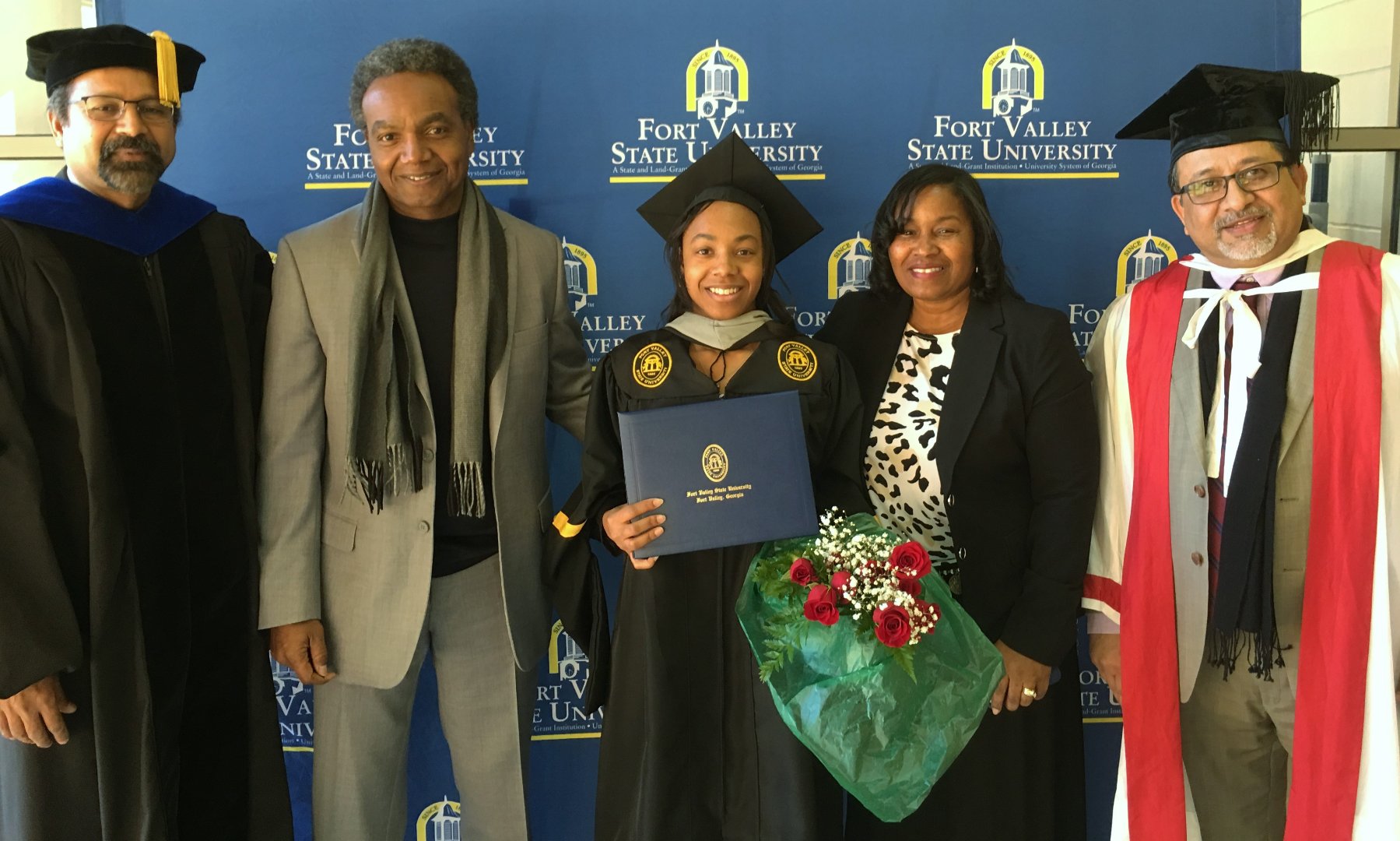 Jackson earned a Master of Science in biotechnology from Fort Valley State University in 2016. She is pictured with her parents, along with Dr. Govind Kannan (left), FVSU’s associate dean for research, and Dr. Nirmal Joshee (right), plant science professor.