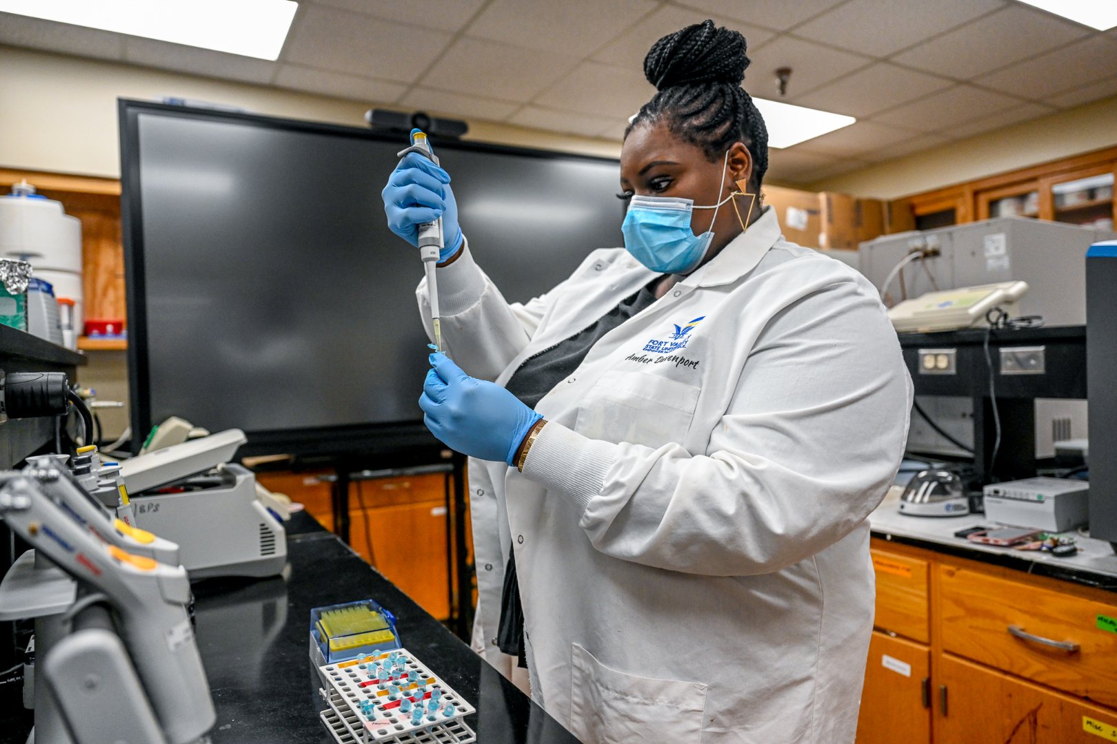 Davenport conducts research in the lab.