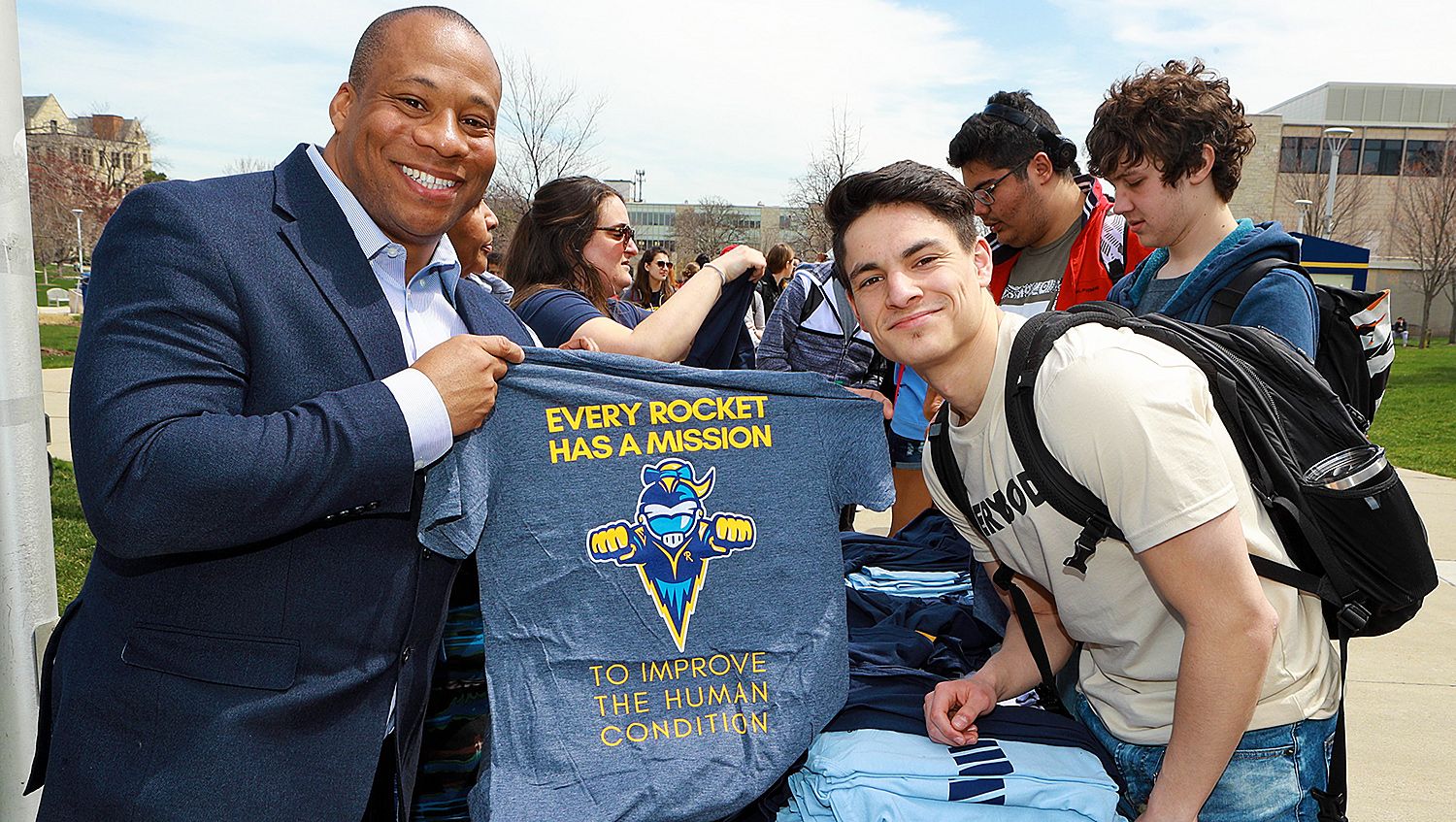 Dr. Sammy Spann in his role as associate vice president and dean of students for the Division of Student Affairs at the University of Toledo interacting with students on campus.