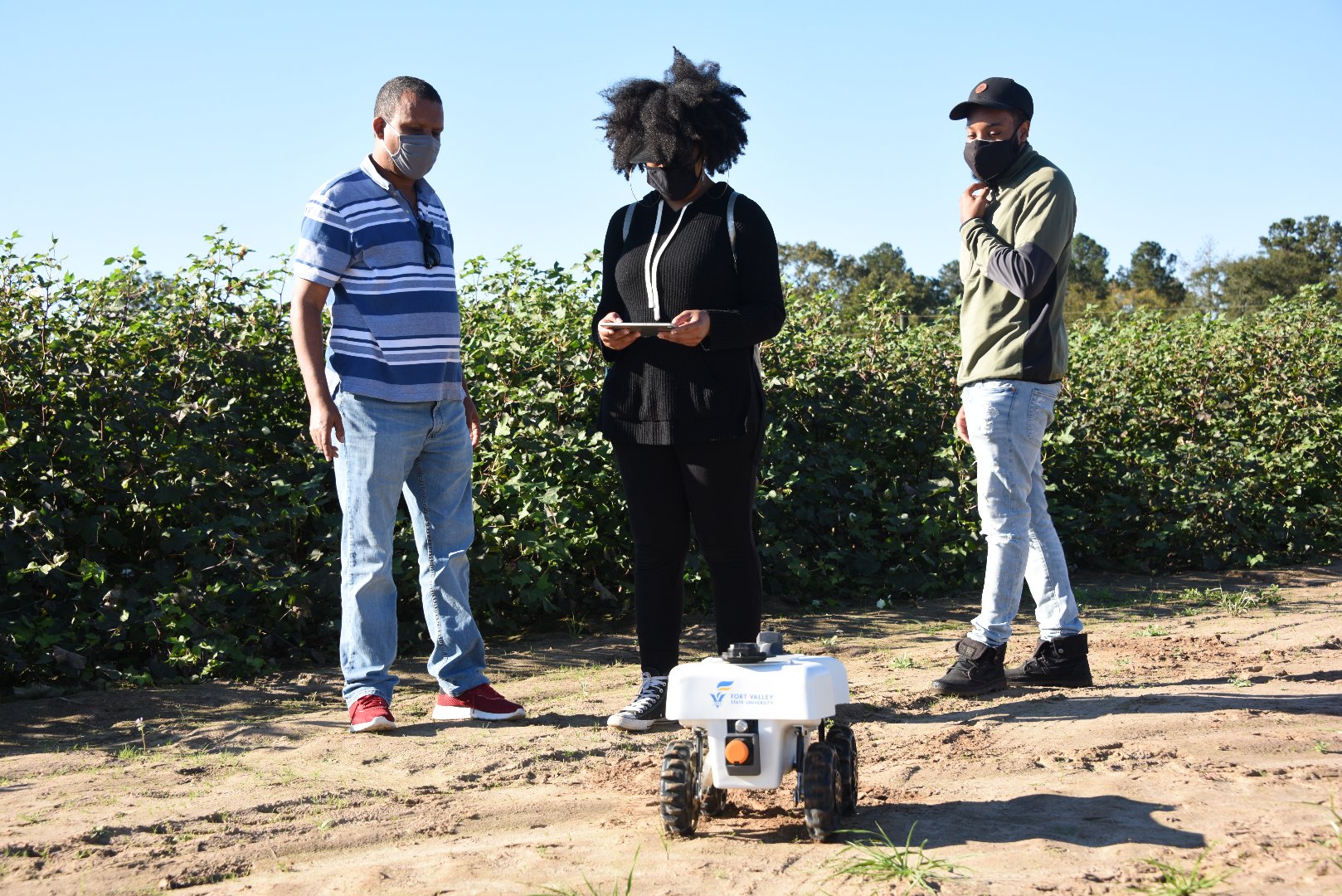 Students test out the TerraSentia robot on the off-campus farm.