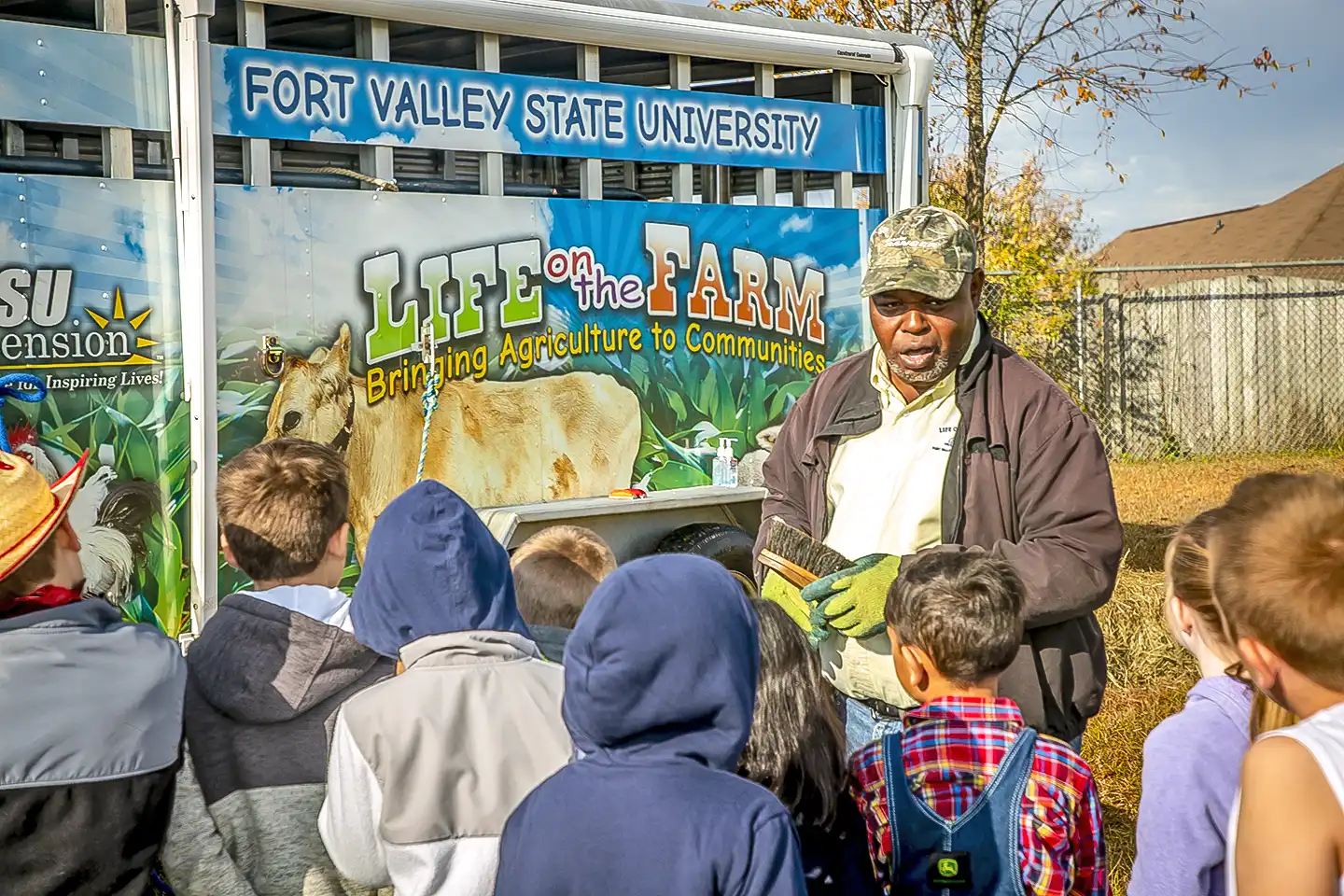 Children learning about farm animals.