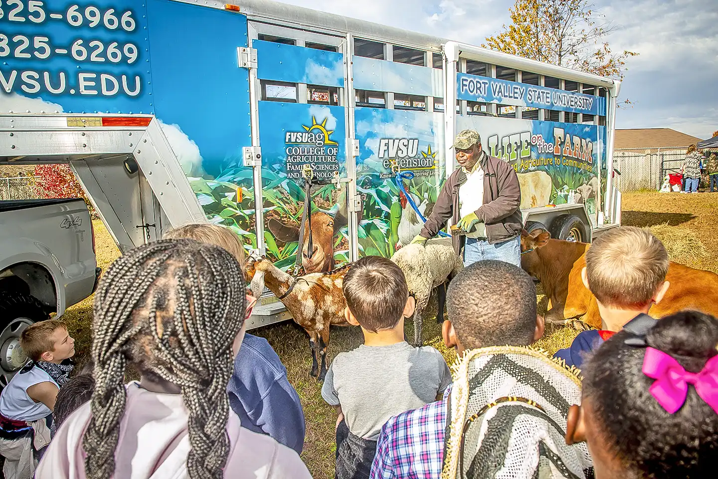 Children learning about farm animals.