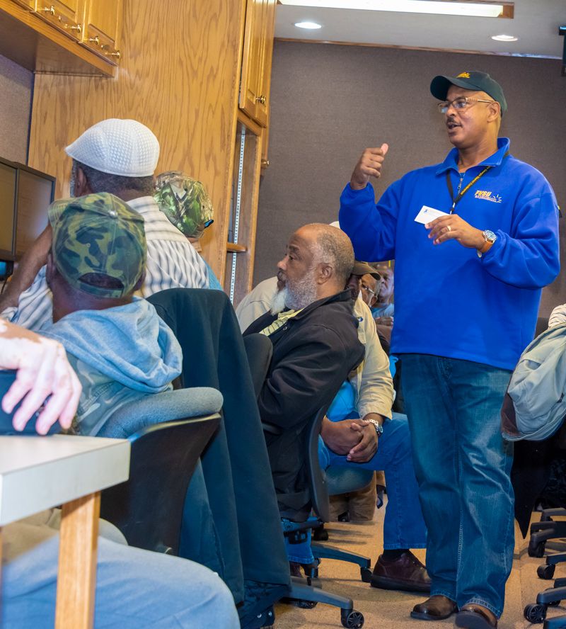 Charlie Grace, FVSU area Extension agent, conducts a records keeping class to farmers using computers on the MITC.