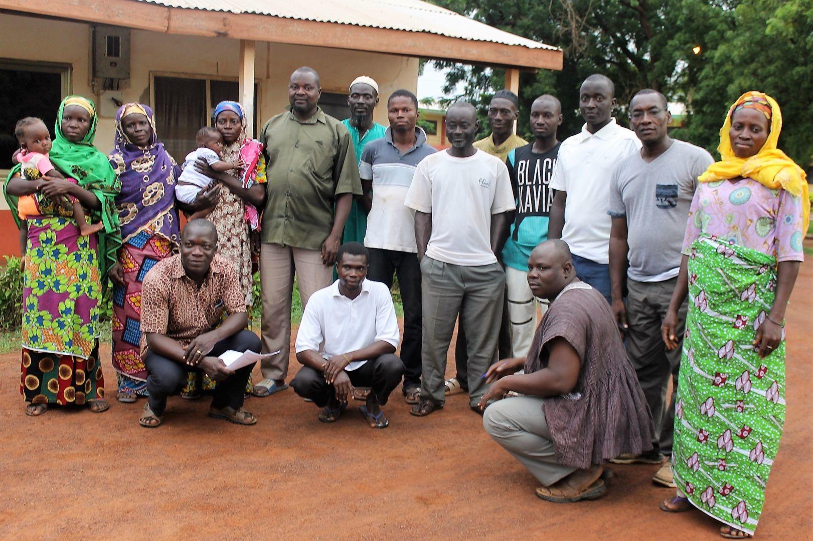 Dr. Mohammed Ibrahim (standing, second from right), Fort Valley State University associate professor of agricultural economics, visiting with farmers in Northern Ghana.