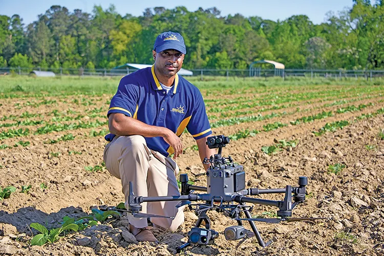 Man posing with a drone